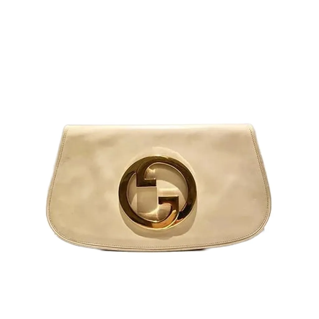 1980s GUCCI BLONDIE UNICORN INTERLOCKING GOLD LOGO CLUTCH BAG