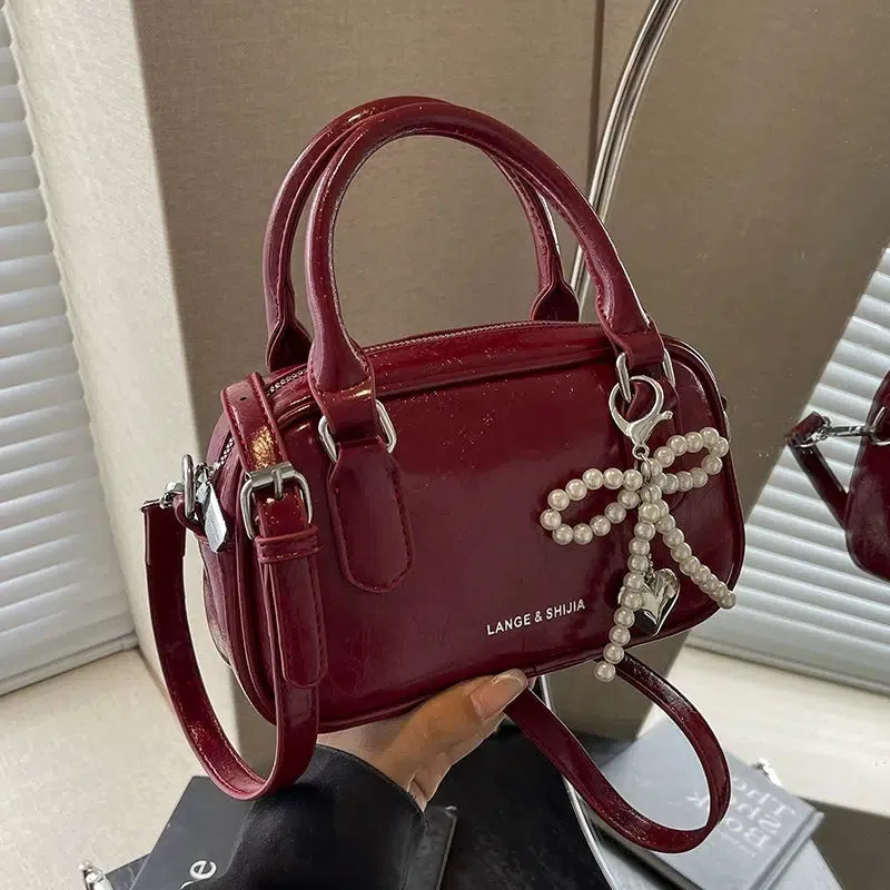 Bow Mini Leather Crossbody Bag