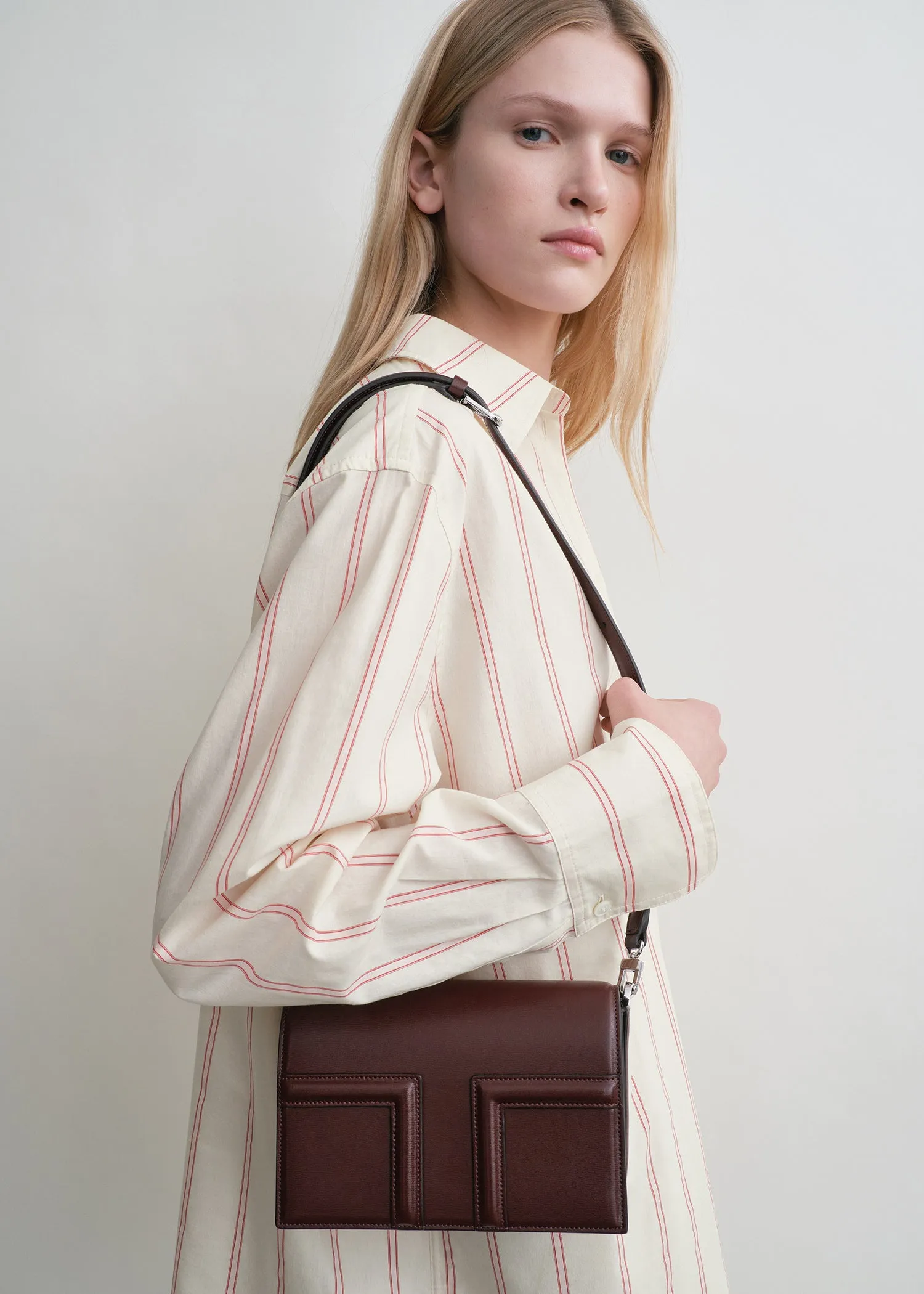 Mini T-flap leather bag bordeaux